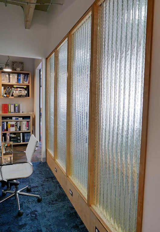 Clear corrugated glass conference room wall