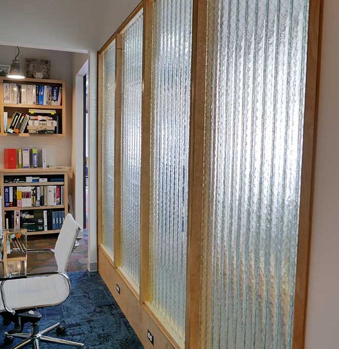 Clear corrugated glass conference room wall